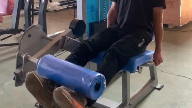 Máquina de extensión de cuádriceps